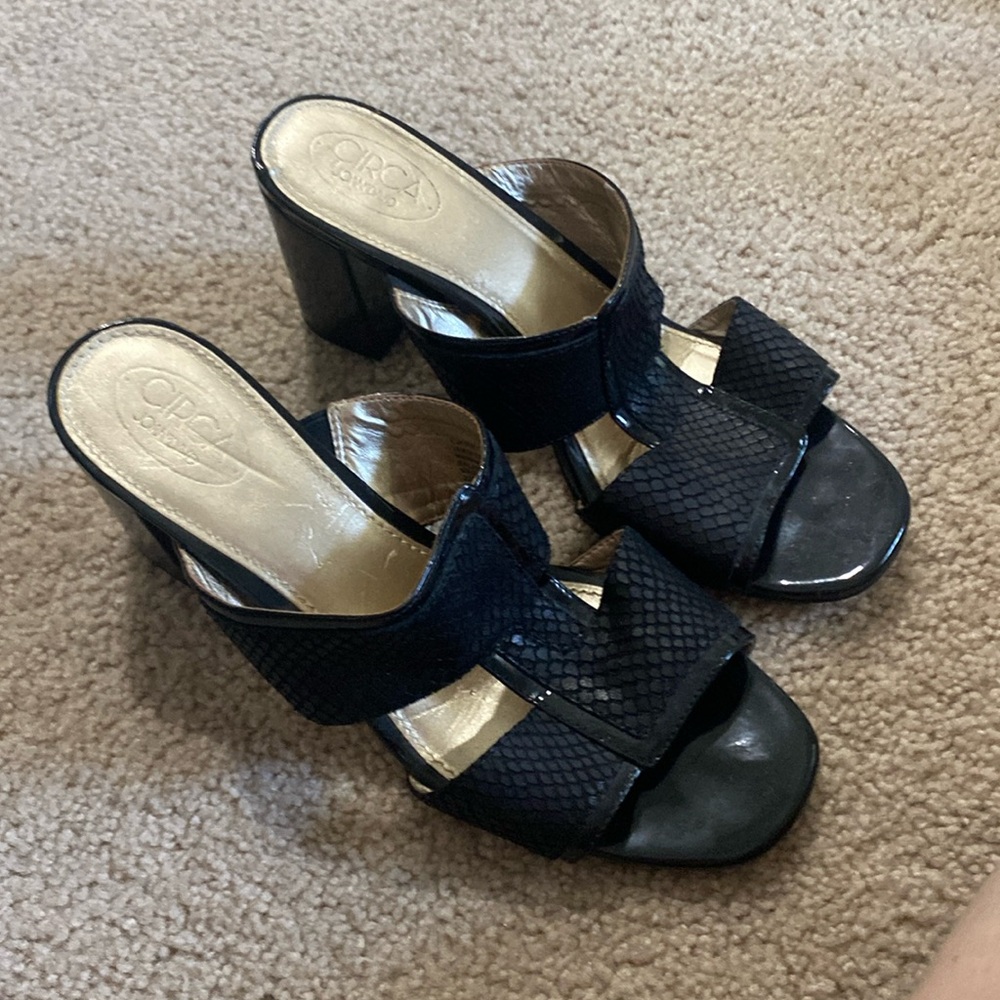 Womems size 8 chunky heel sandal look of snake skin.  Genuine leather upper